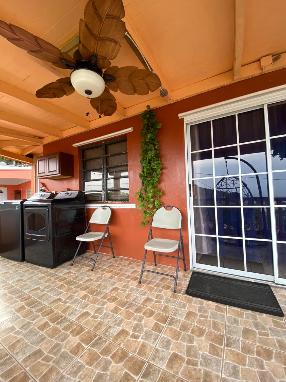 Covered front balcony at 60 Anna's Fancy